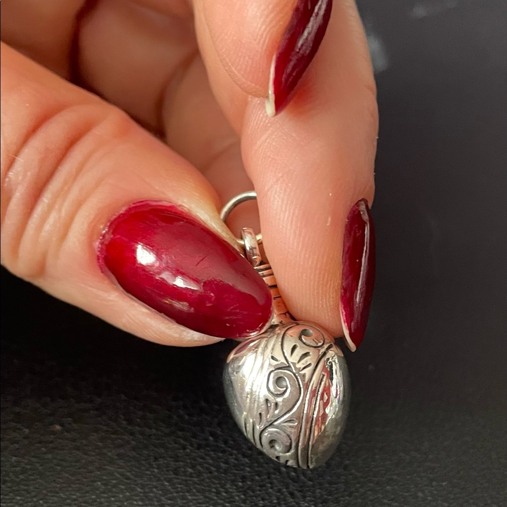 Sweet little silver pendent.